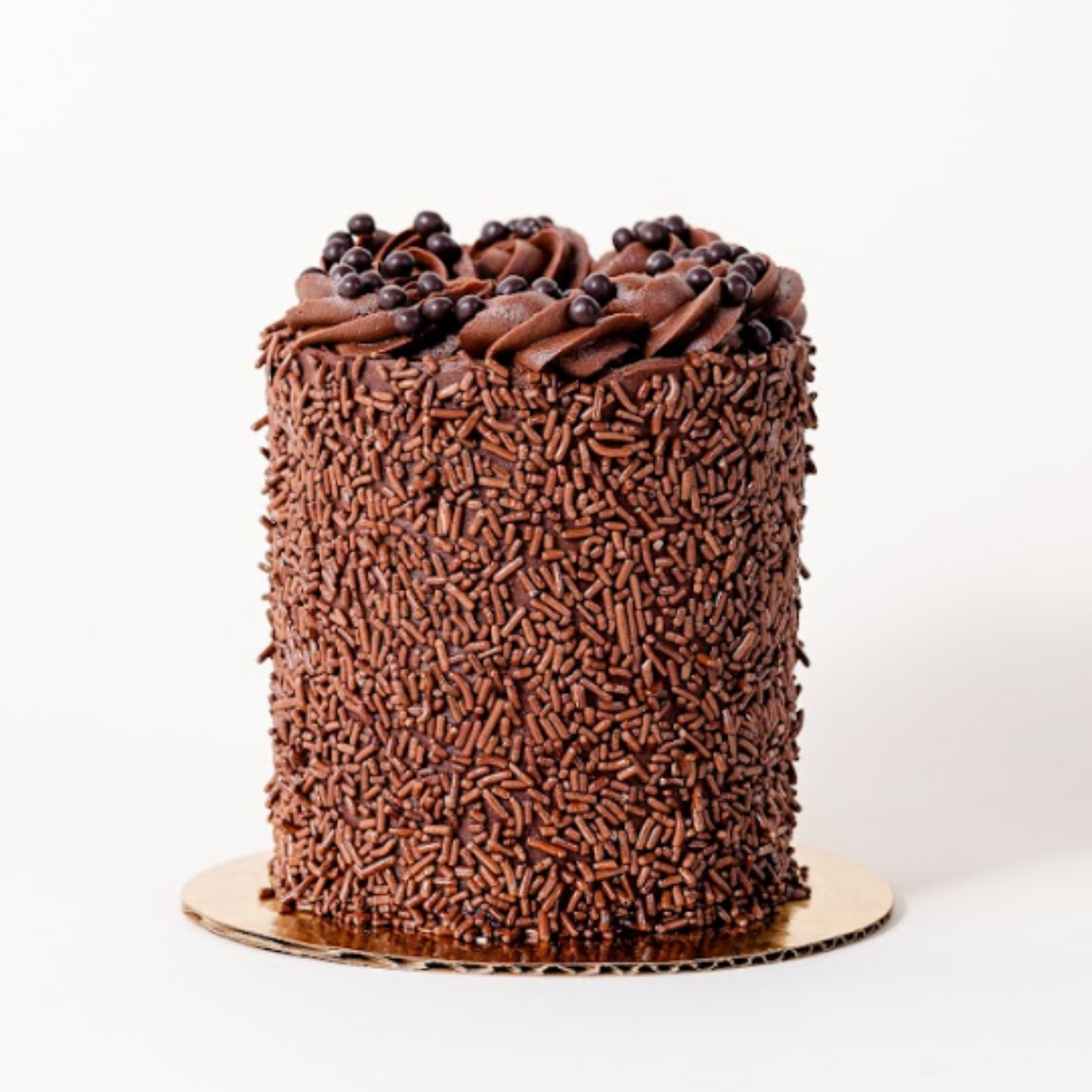 Double chocolate cake with chocolate sprinkles and crunchy pearls