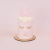 light pink cake disguised as a bunny