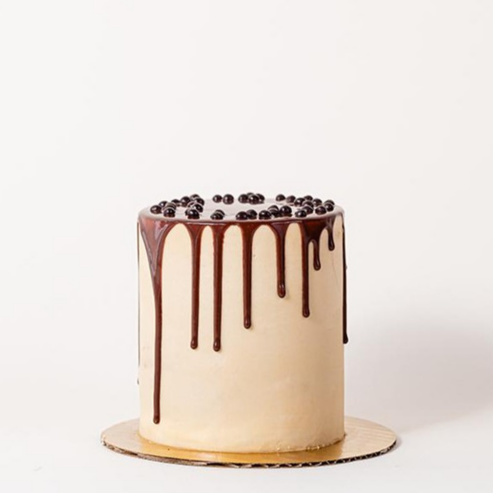 Espresso crunch cake with chocolate ganache and crunchy pearls