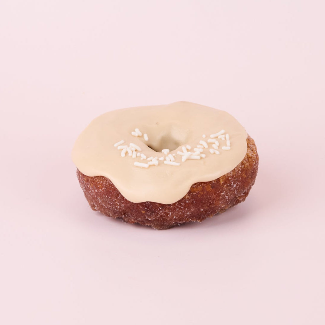 Donut with maple glaze and white sprinkles