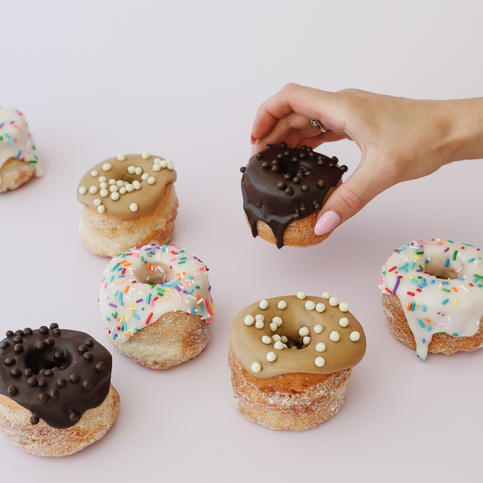 Box of 24 mini croissant doughnuts with assorted glazes