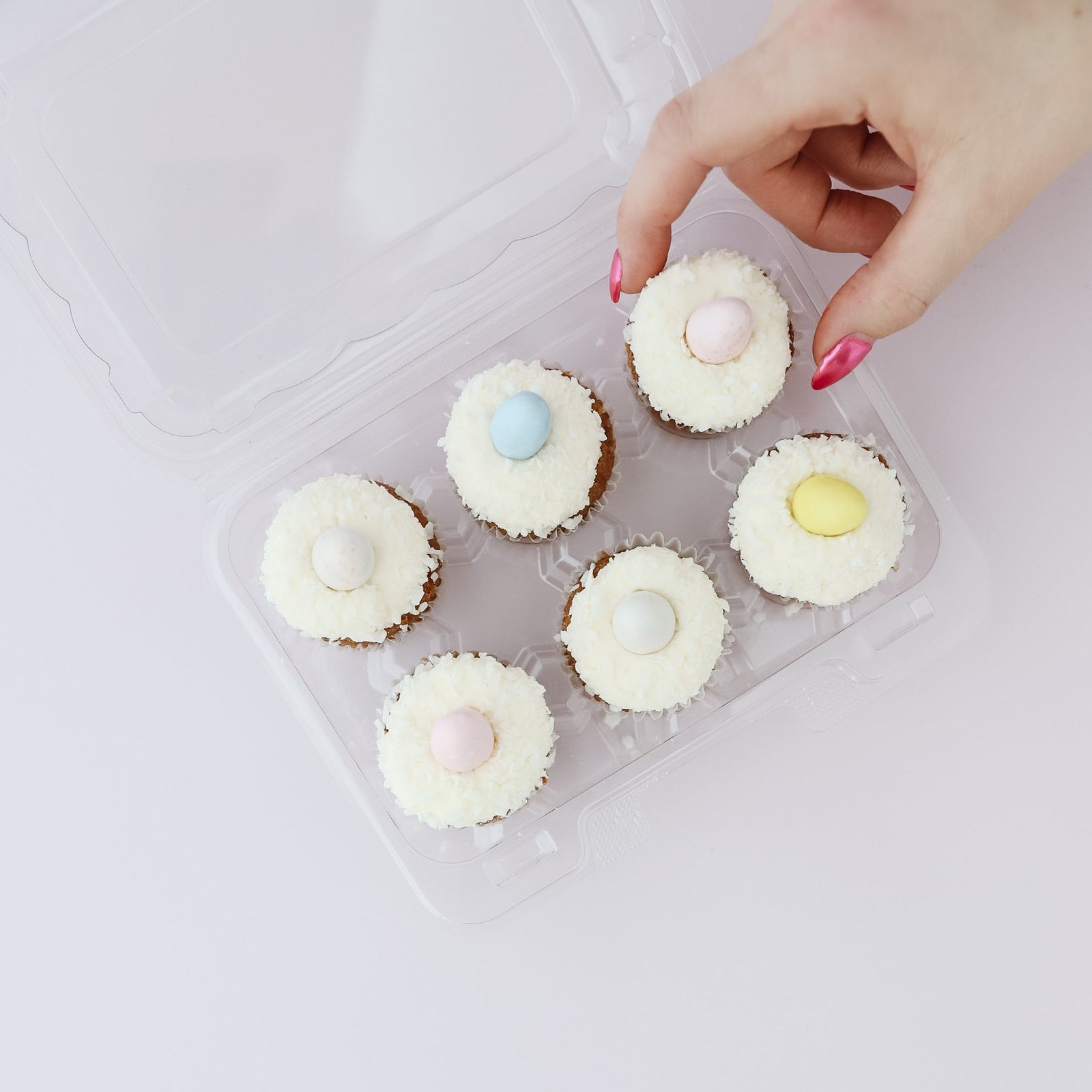mini easter egg cupcakes topped with vanilla buttercream and mini robins eggs